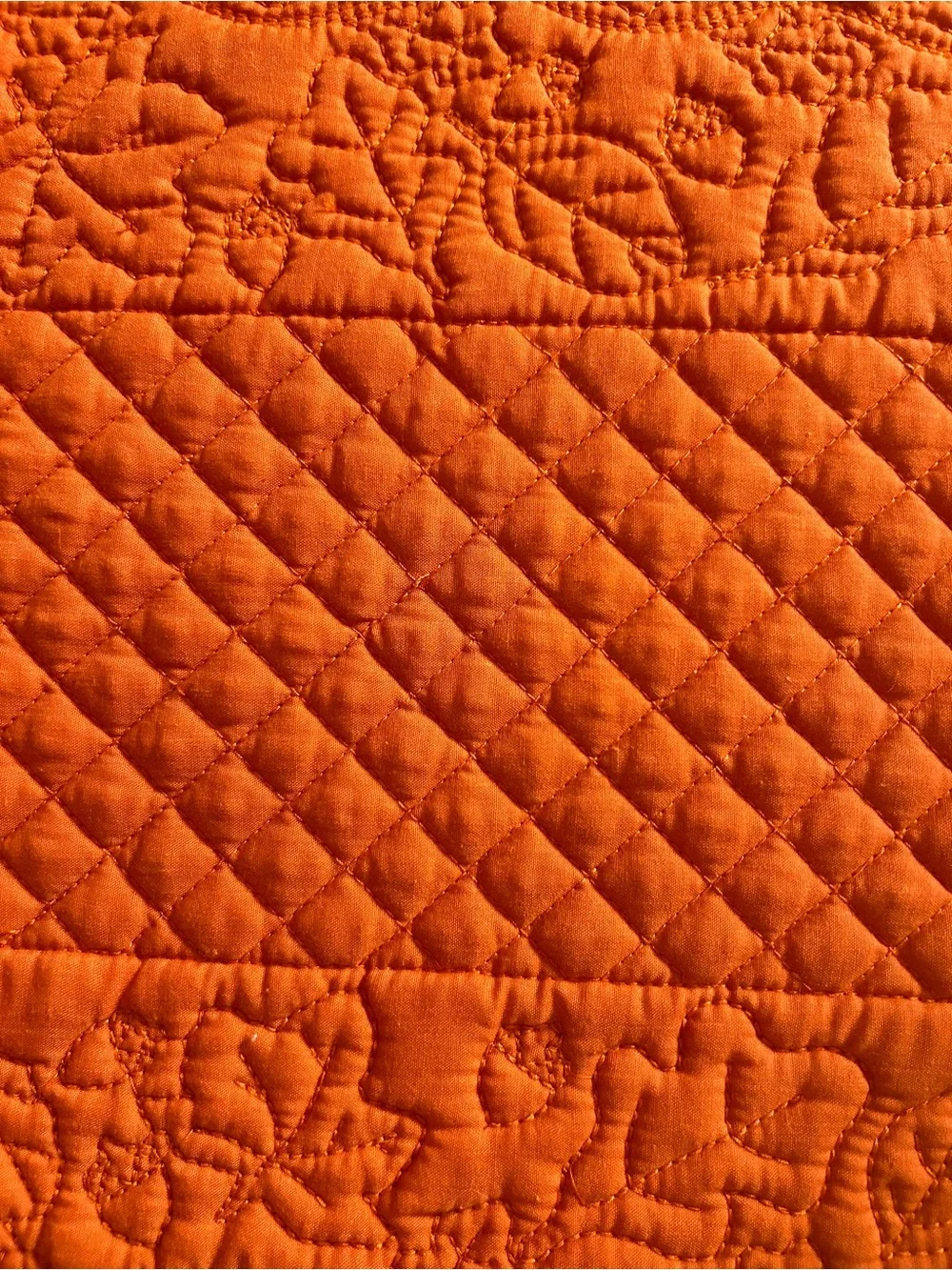 N/A quilted floral motif